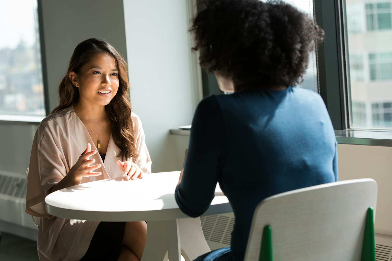 Homeowner in a relaxed one-on-one strategy session talking through how to sell an inherited house