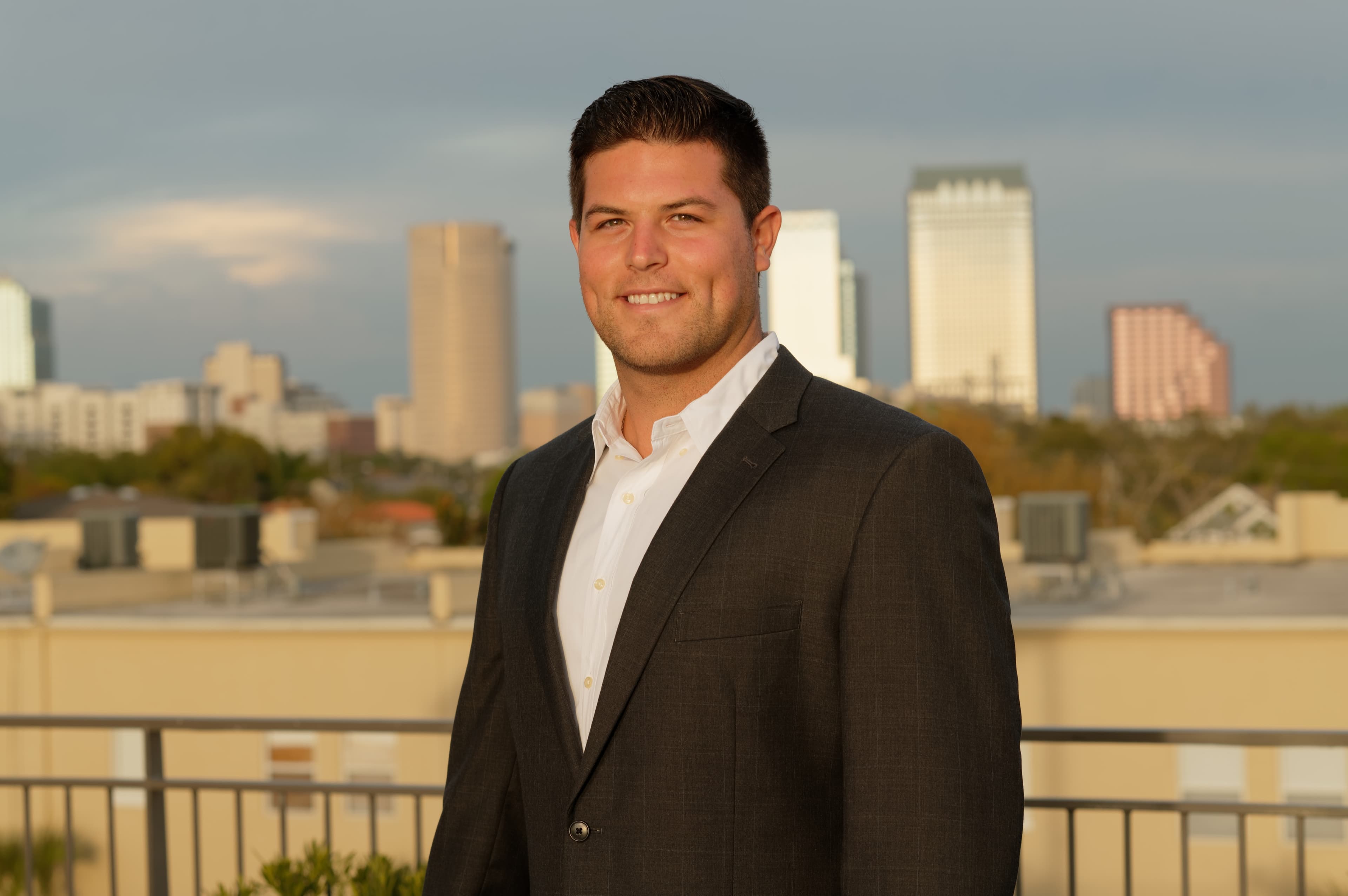 Portrait of Jake Schmidt, head of brokerage and investment strategy at Acquire Quick